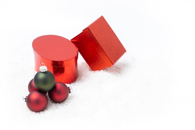 Horizontal christmas decoration on white background and snow