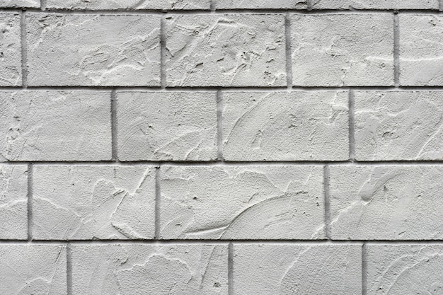 Horizontal concrete wall textured background. White grey rustic color.  Grungy Shabby Uneven Painted Plaster. 