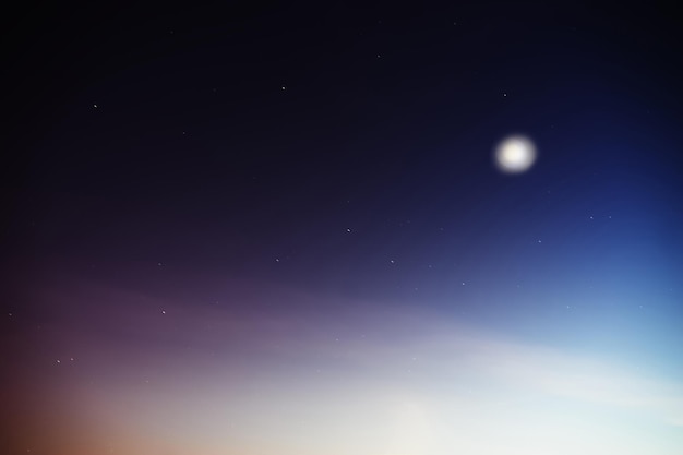 Horizontal glowing night moon with falling stars background