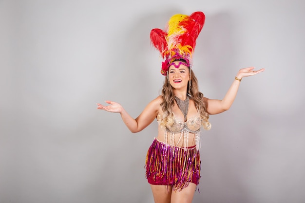 Horizontal half body shot beautiful Brazilian woman in carnival clothes welcome