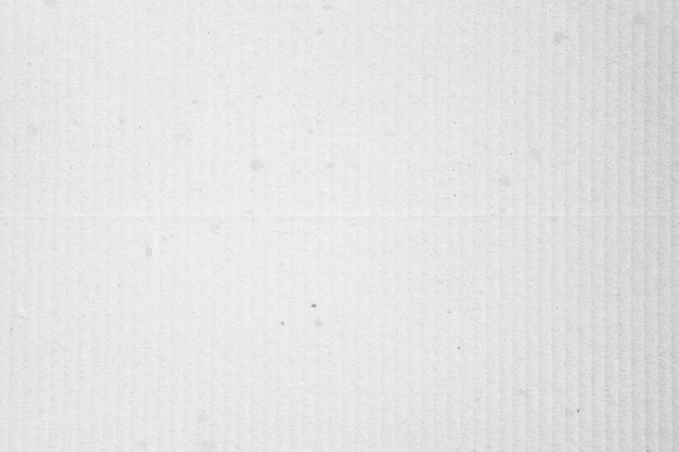 Foto scatola orizzontale in cartone kraft con linee e macchie di consistenza cartacea