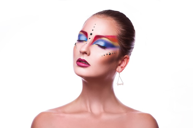 Horizontal photo of sensual adult girl with multicolor make up