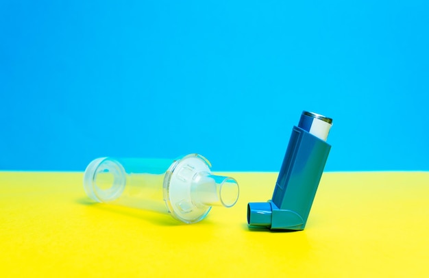 Horizontal photograph of an asthma inhaler Remedy for asthma Allergic diseases Copy space