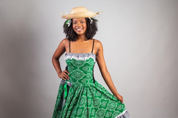 Horizontal portrait black Brazilian woman in festa junina clothes Saint John's festival