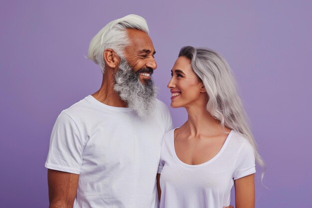 Horizontal shot of mixed race couple stand closely to each other isolated over background
