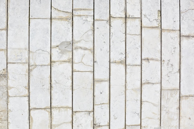 horizontal texture of gray tiles on the wall