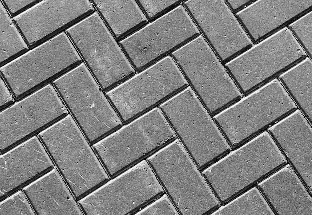 Horizontal vivid black and white street pavement textured background backdrop