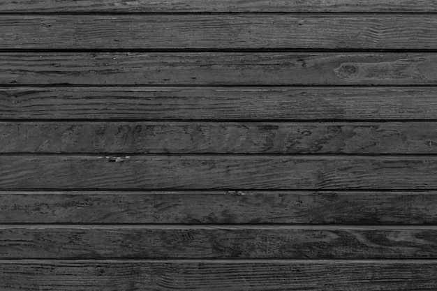 Horizontale zwarte houten achtergrond. Oude donkere houten achtergrond met zwarte houtstructuur. Donker houtstructuurpaneel met horizontale planken.