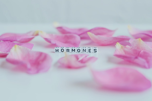 Hormones word with flowers petals