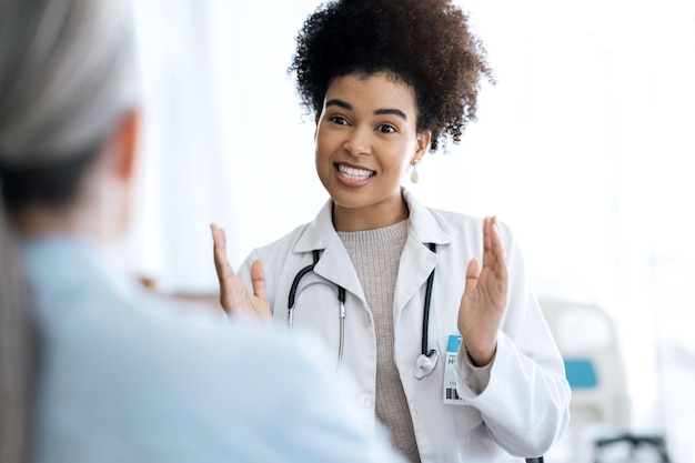 Hospital consulting and doctor with patient for discussion talking and empathy for diagnosis news Healthcare clinic and health worker explain to person for support wellness and medical results