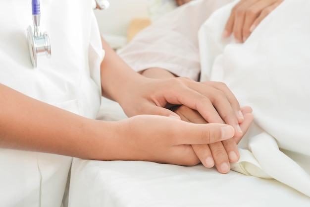 hospital patient hands to care