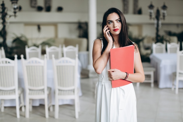 Hostess calling in restaurant