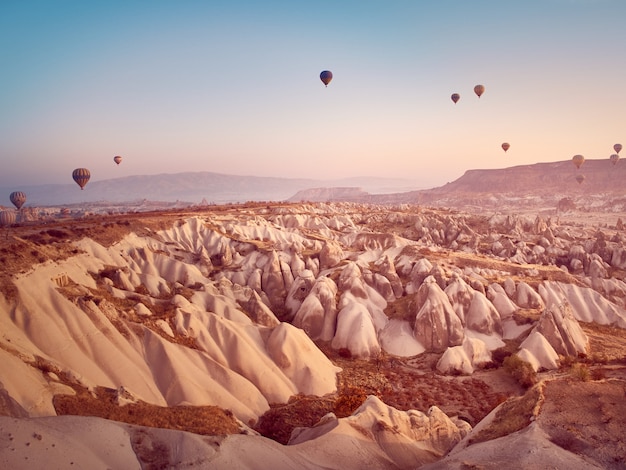 Hot air balloon in Cappadocia on the sunrise.