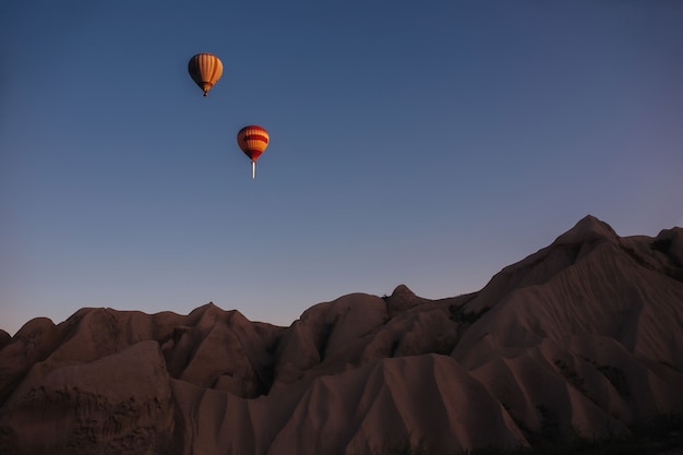 Hot air balloon parade in cappadocia at sunrise