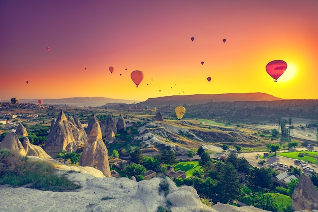 Hot air balloons flying over spectacular cappadocia