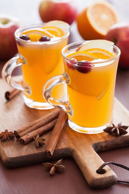 Hot apple orange cider with cinnamon spice warming drink