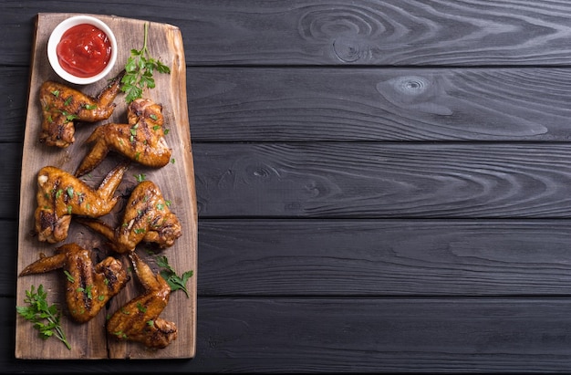 hot bbq grilled chicken wings with tomato sauce barbecue food