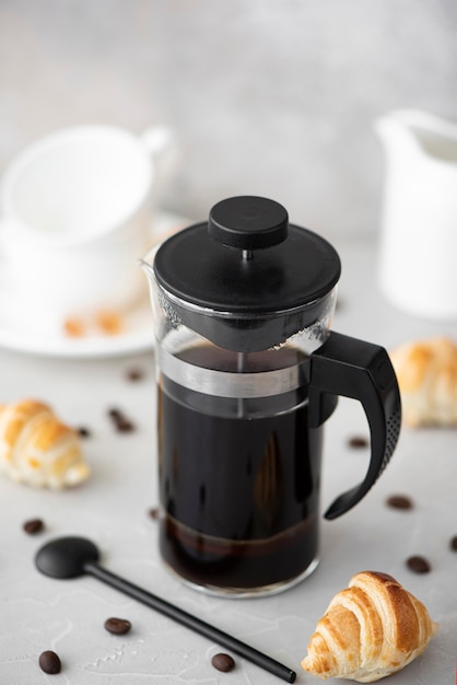 Hot black coffee in a glass coffee pot