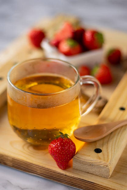 hot black tea with strawberries