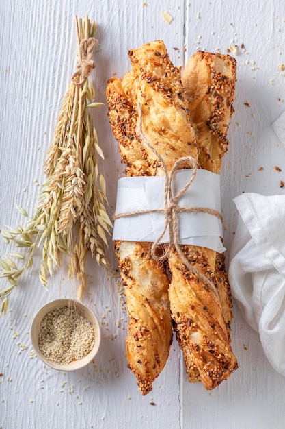 Hot bread sticks with grains and sesame seeds