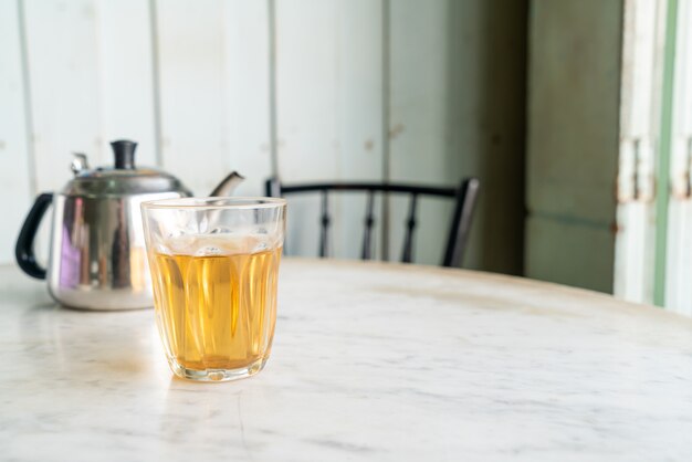 hot Chinese tea in glass on table