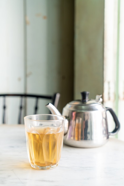 hot Chinese tea in glass on table