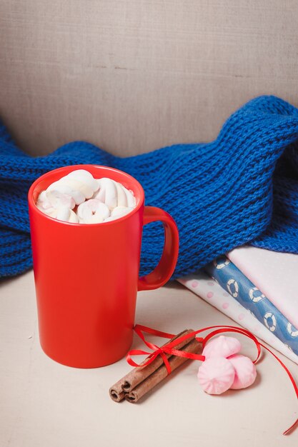 Hot chocolate drink with marshmallow, beze, cinamon