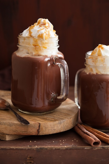 Hot chocolate with whipped cream caramel in mason jar