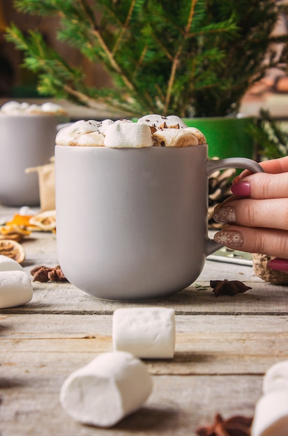 Hot cocoa with marshmallows. Christmas background. Drinks.