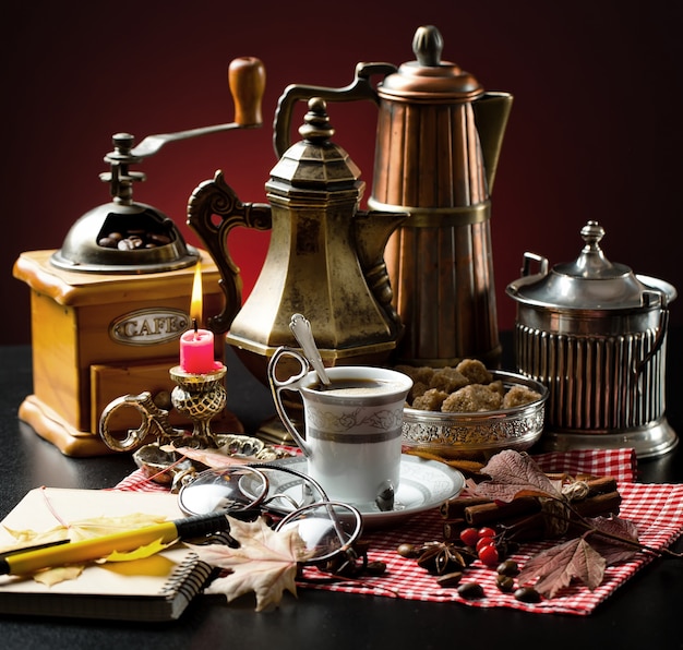 Hot coffee in a cup on an old background