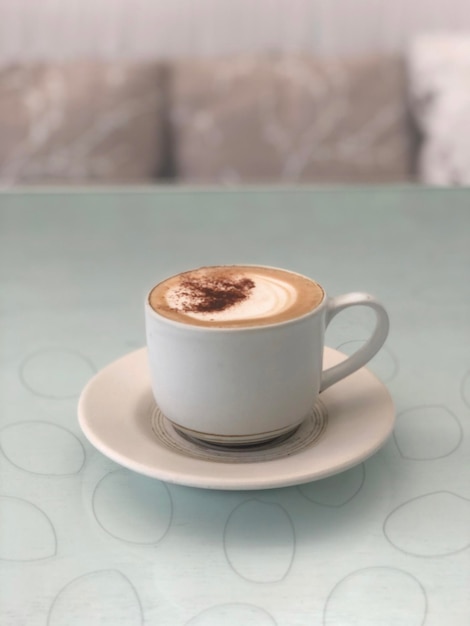 Hot coffee cup on table