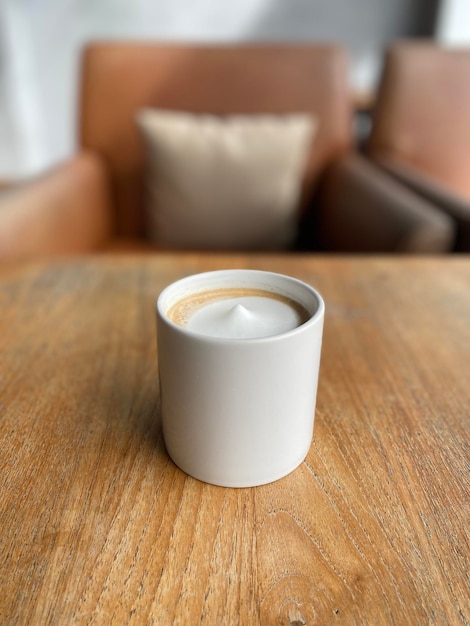 Hot coffee cup on table