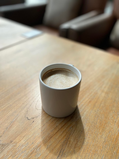 Hot coffee cup on table