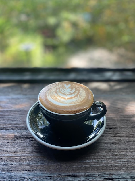 Hot coffee cup on table