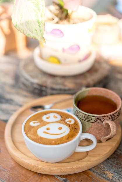 Hot coffee cup on wooden table