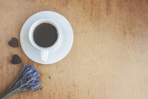 Hot coffee in the hands. Drinks. Selective focus.