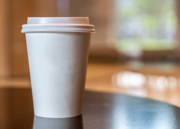 hot coffee paper cup in coffee shop