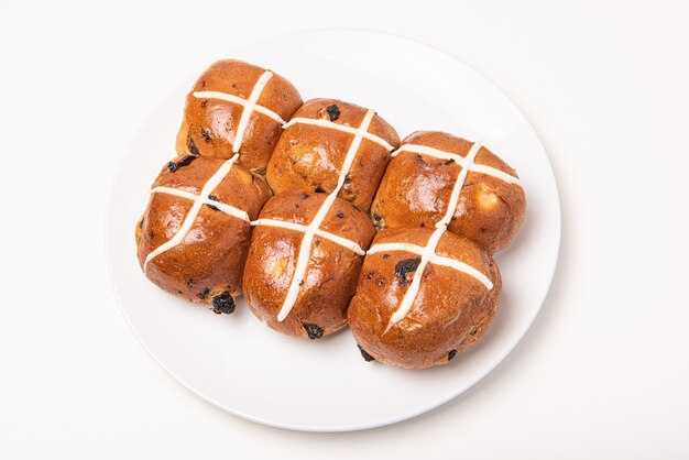 Hot cross bun on white background