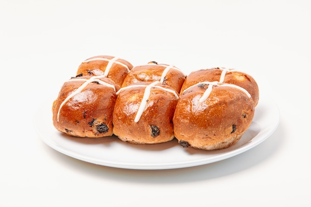 Hot cross bun on white background