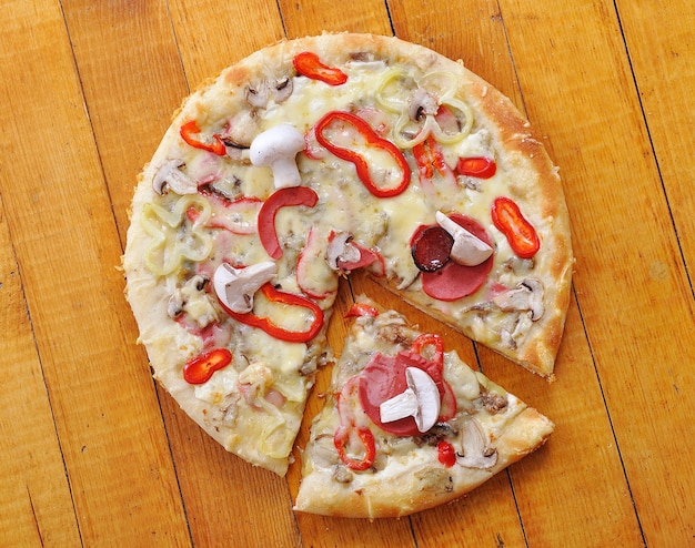 A hot, delicious  pizza with hot and bubbly cheese 