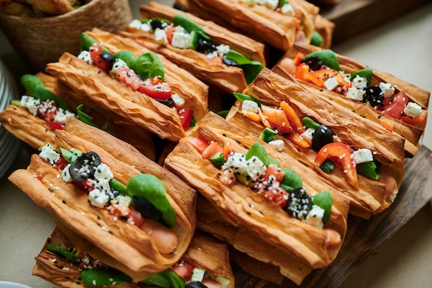 Hot dogs from puff pastry on the bakery counter