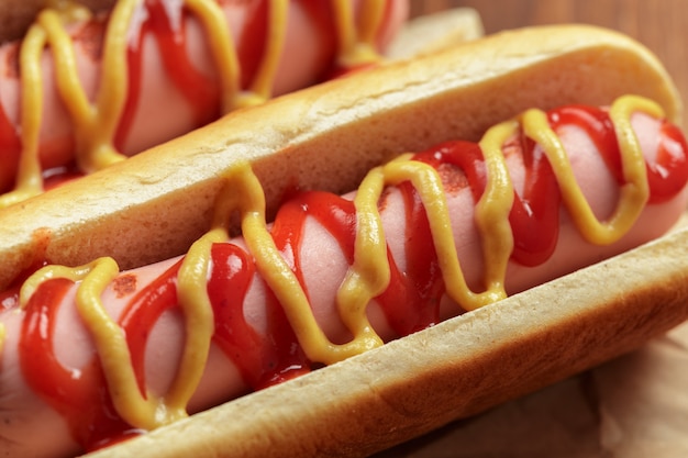 Hot dogs on wooden background