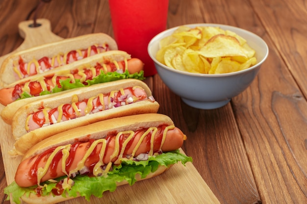 Hot dogs on wooden background