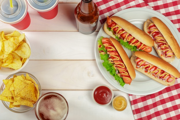 Hot dogs on wooden background