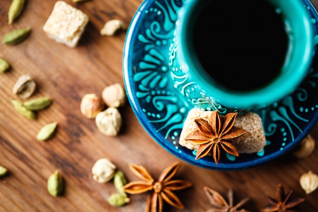 Hot drink with spices in authentic cup