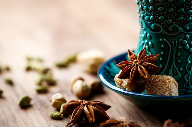 Hot drink with spices in authentic cup