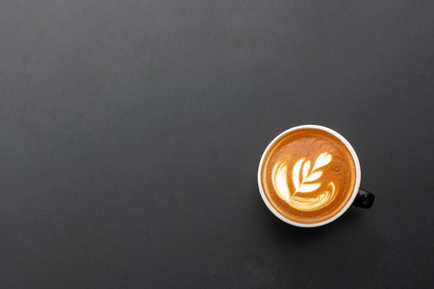 Hot espresso on black table