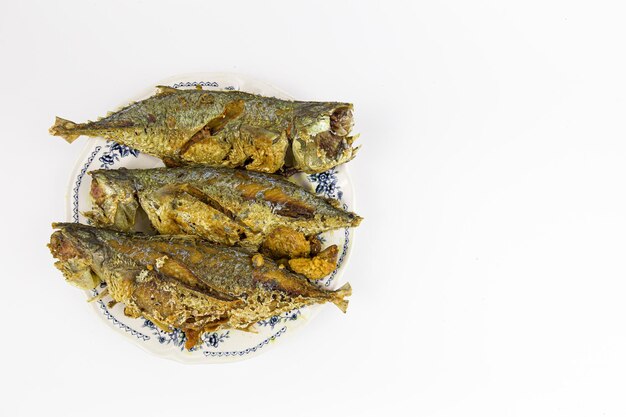 Hot fried fish isolated on white background