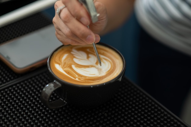 Hot latte art coffee on table relax time