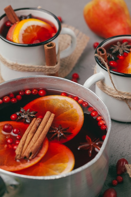 hot mulled wine in rustic cup close up